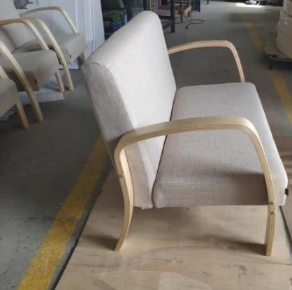 KD living room sofa with curved wood armrests and solid wood frame
