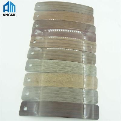 China Made Customized Wood Grain/ Solid Color/High Glossy/Embossed//Matt of High Quality and High Tenacity PVC Edge Banding for Furniture